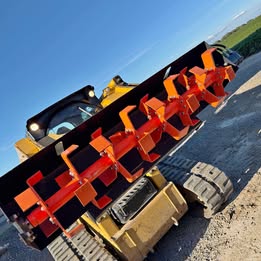 Tiller for skid loader.